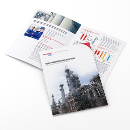 A brochure showing industrial refinery images and graphics related to UOP hydroprocessing solutions. The tone is professional and informative.