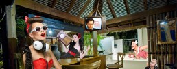 Retro-themed scene with three women in vintage attire inside a tropical bar. One holds a radio, another has headphones. A TV with a classic image of a man is visible. The mood is playful and nostalgic.