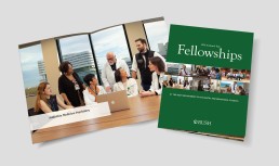 Open brochure showing a diverse group of six medical professionals discussing at a table, titled 