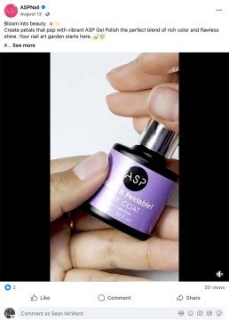 Close-up of hands holding a bottle of ASP Gel Polish with a metallic purple label. The text on the label reads 